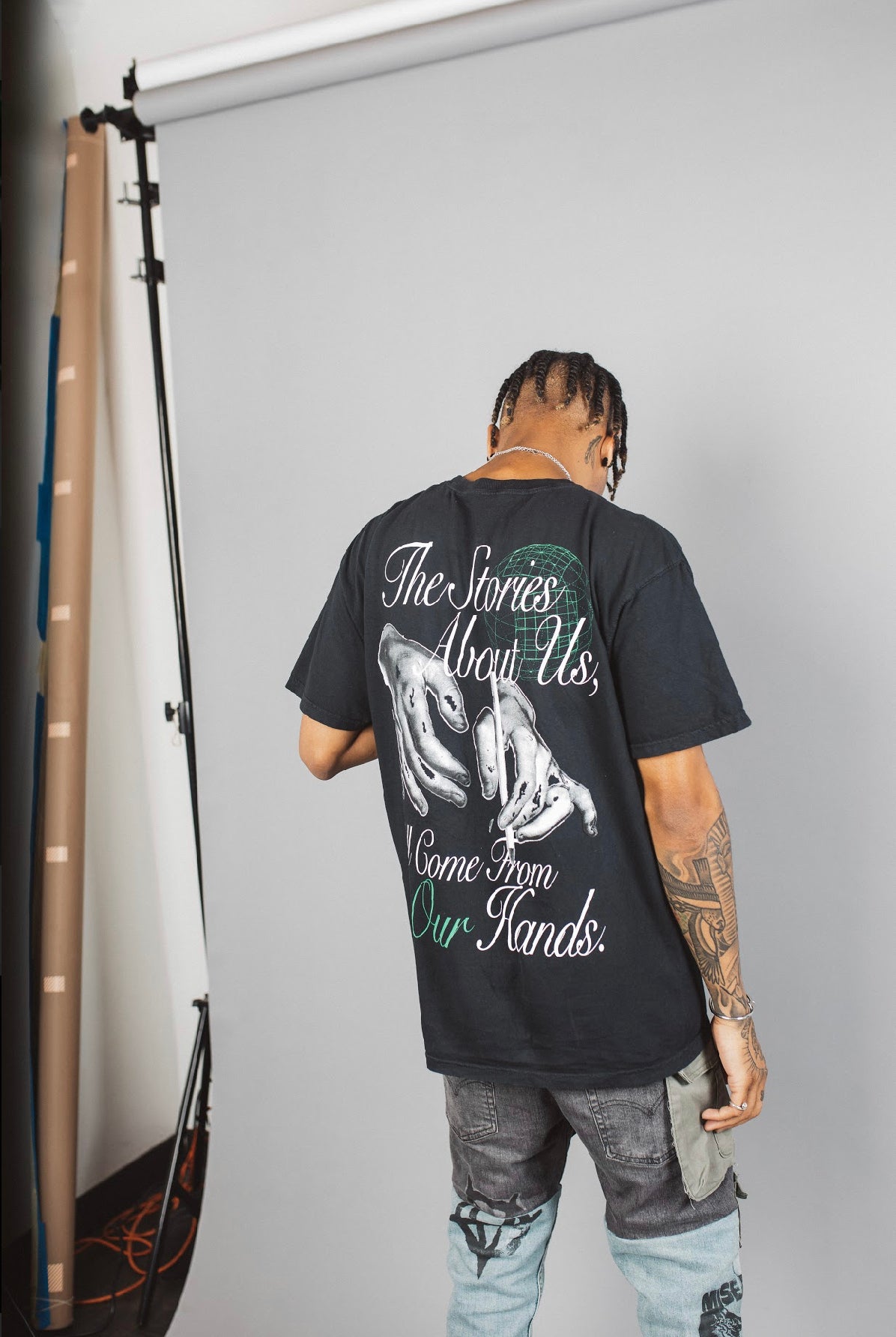 “From Our Hands” Tee Shirt (black//green)